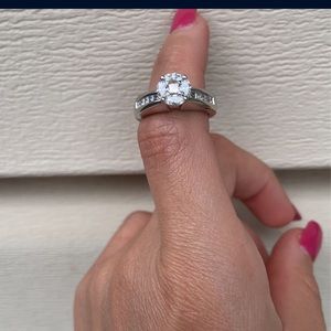 Woman’s 14K White Gold Diamond Cluster Engagement Ring.